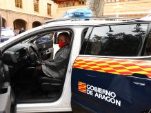 La consejera Mayte Pérez, en la presentación de los nuevos vehículos de la Unidad Adscrita de la Policía en Aragón